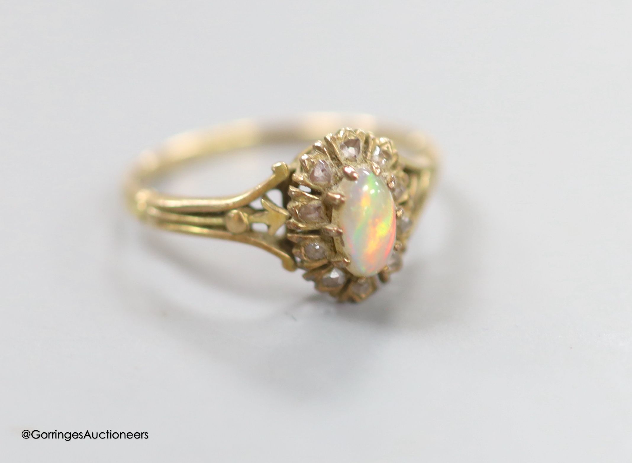 An early 20th century Austro Hungarian? yellow metal, opal and rose cut diamond set oval dress ring, size P, 2.7 grams.